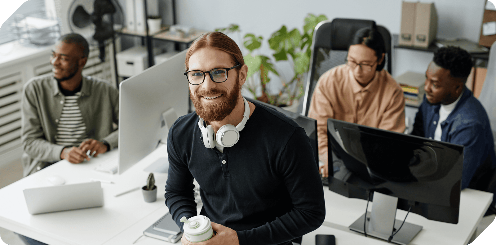 Software product team collaborating in a bright studio